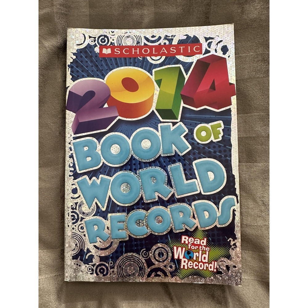 Scholastic 2014 Book of World Records Softcover Kids Facts Science Pop Culture